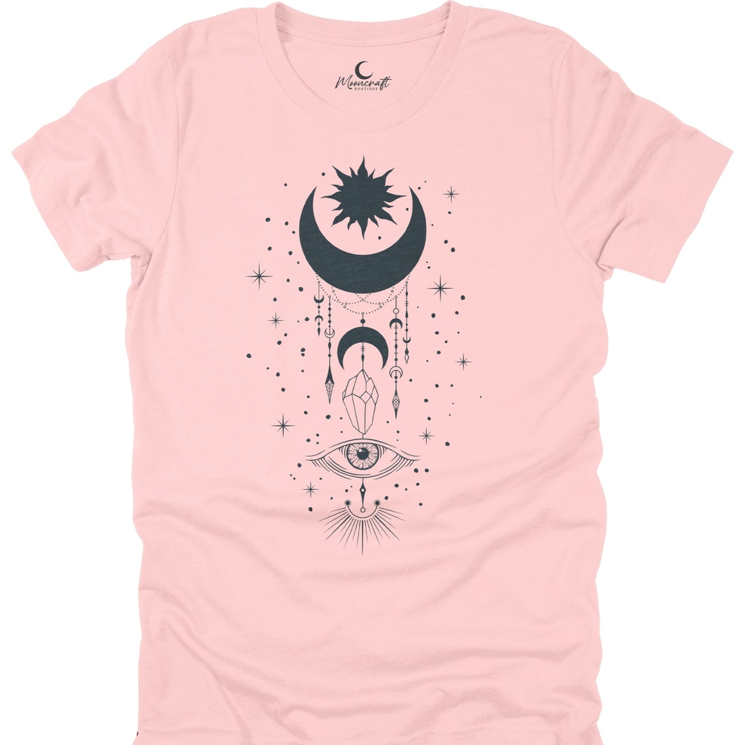 Pink t-shirt with black celestial design featuring a moon, star, and eye on a white background.