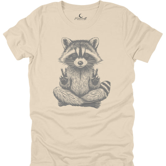 Beige t-shirt with a raccoon graphic on a white background