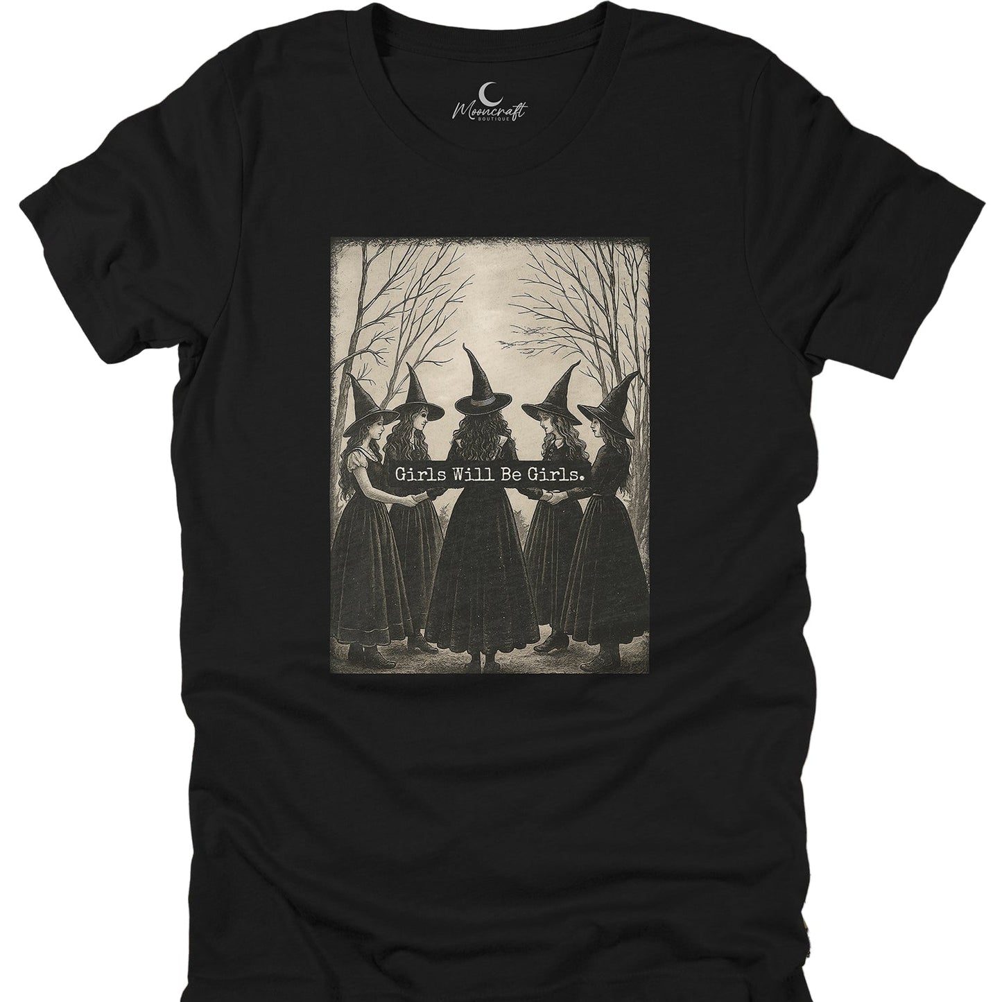 Black t-shirt with graphic of women in witch hats and the text 'Girls Will Be Girls' on a white background.