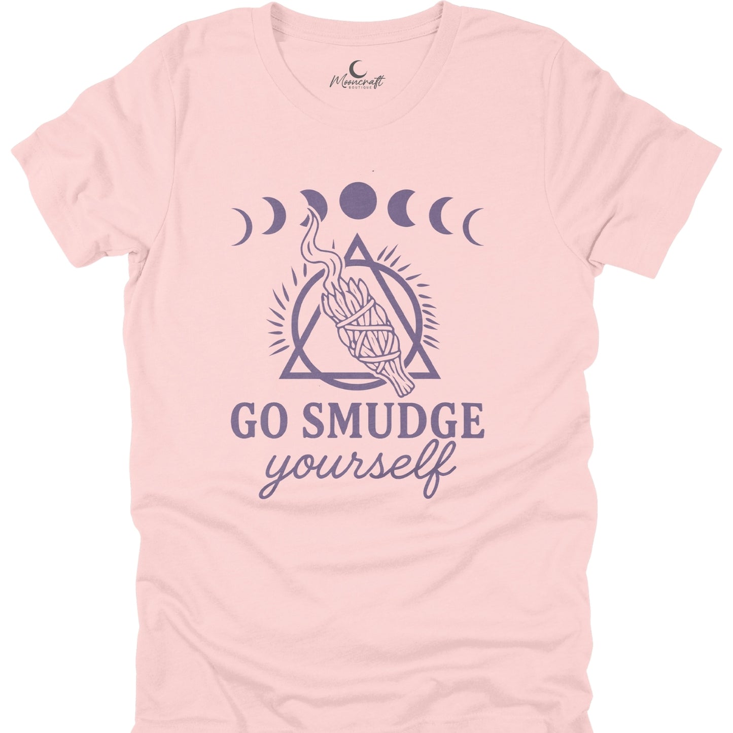 Pink t-shirt with purple graphic and text 'Go Smudge Yourself' on a white background