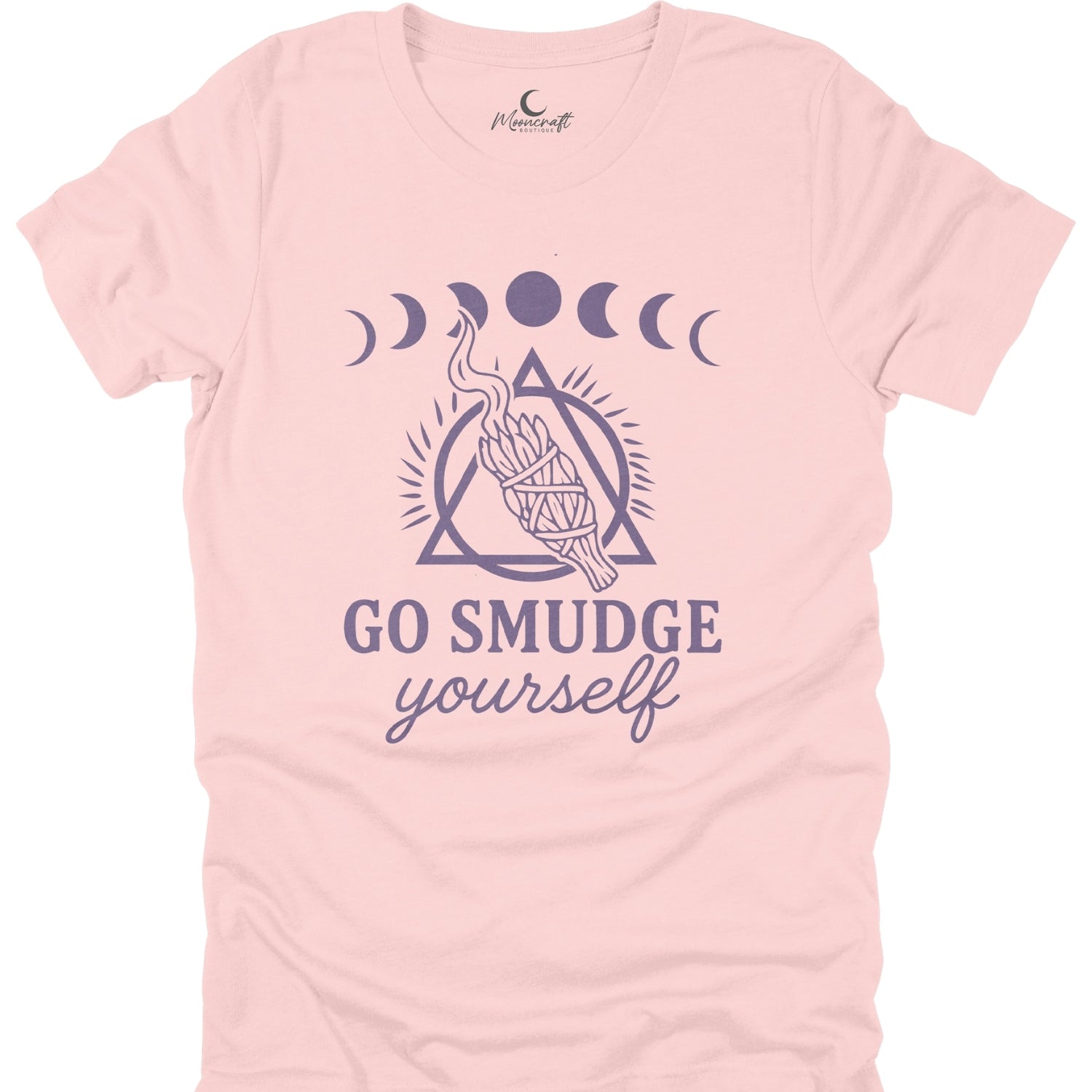 Pink t-shirt with purple graphic and text 'Go Smudge Yourself' on a white background