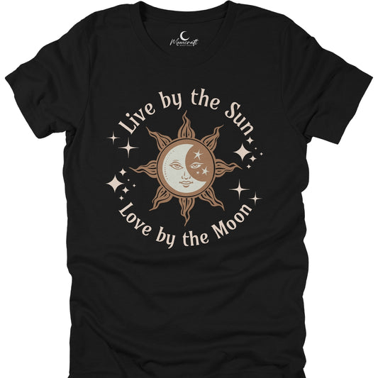 Black t-shirt with sun and moon design and text 'Live by the Sun, Love by the Moon' on a white background.