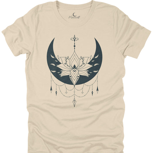 Beige t-shirt with a black crescent moon and floral design on a white background