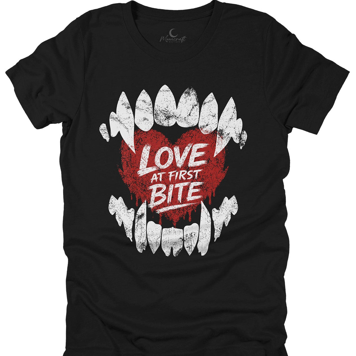 Black t-shirt with a graphic design of vampire teeth and a heart with 'Love at First Bite' text on a white background.