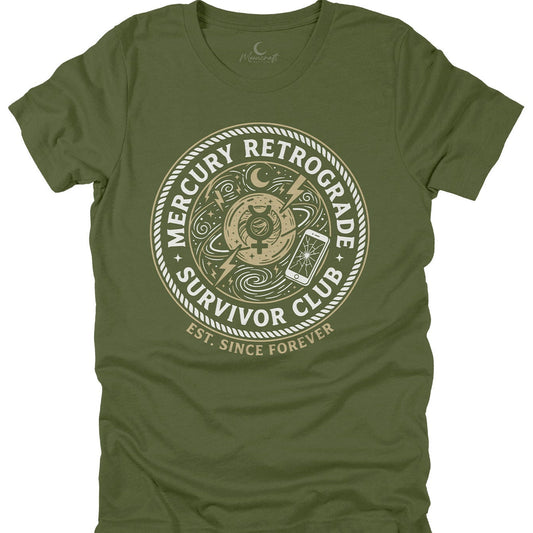 Green t-shirt with 'Mercury Retrograde Survivor Club' graphic design on a white background