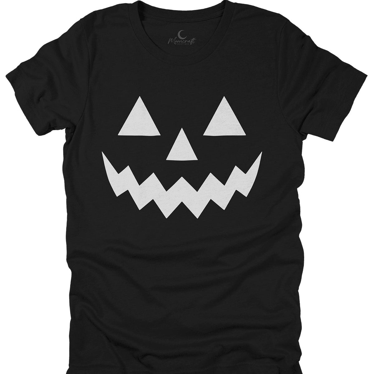 A black short-sleeve t-shirt with a white geometric jack-o'-lantern face printed on the front, displayed flat against a solid white background.