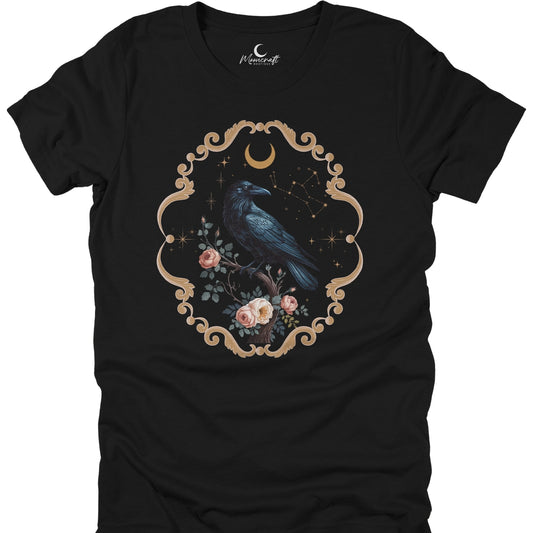 Black t-shirt with a raven and floral design on a white background