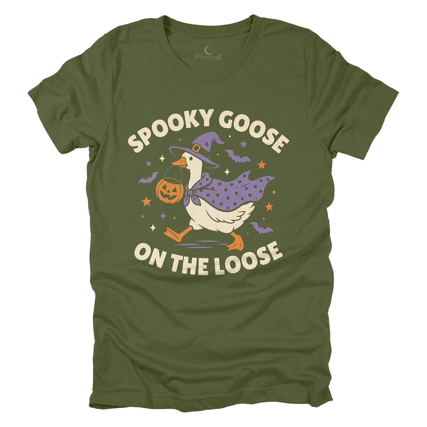 An olive green short-sleeve t-shirt with a graphic of a cartoon goose dressed as a witch carrying a jack-o'-lantern, with the text 'SPOOKY GOOSE ON THE LOOSE' in cream lettering.
