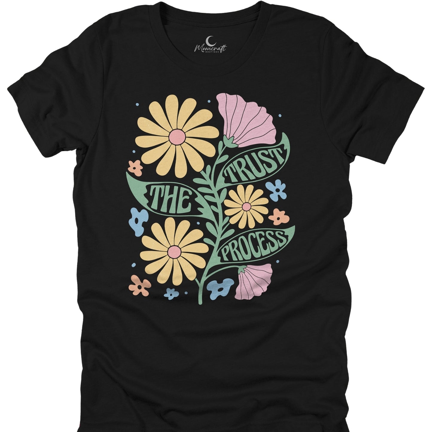 Black t-shirt with colorful floral design and 'Trust the Process' text on a white background