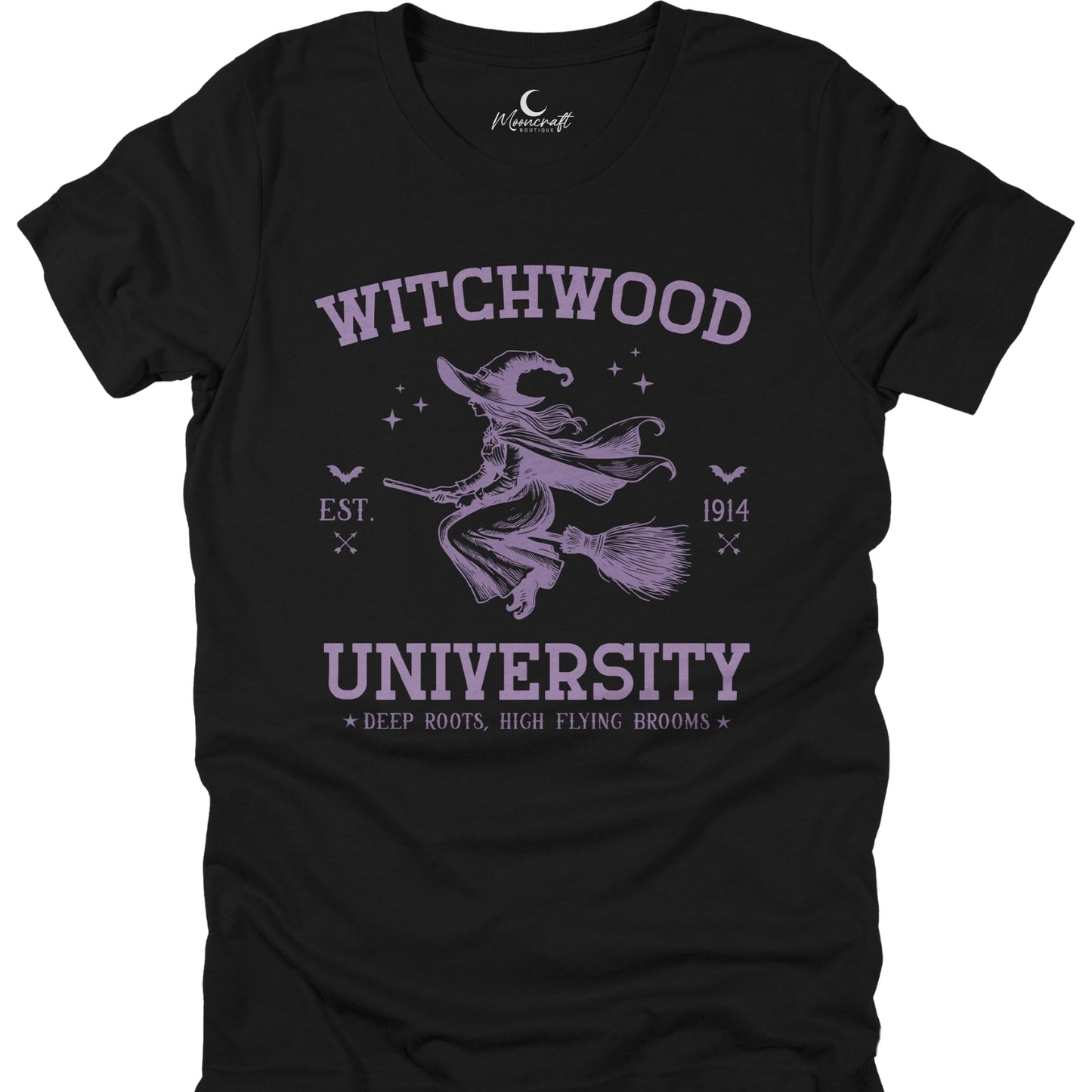 Black t-shirt with purple 'Witchwood University' design featuring a witch on a broomstick.